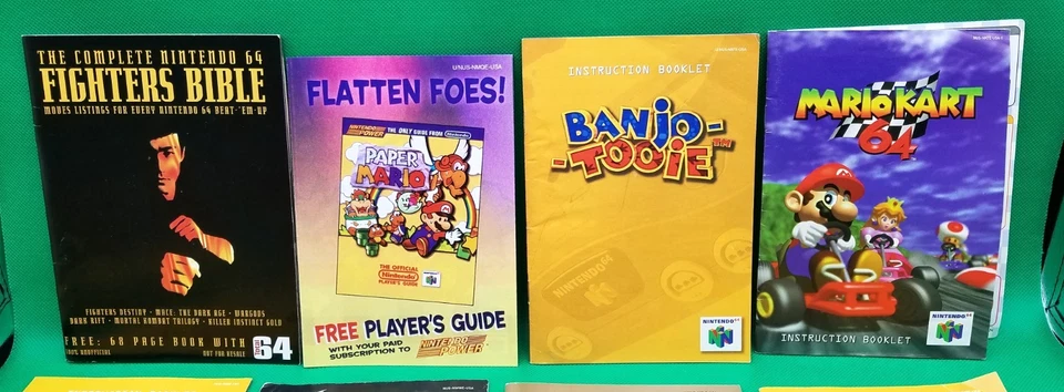 Lote de 11 MANUALES N64 Nintendo 64 folletos de instrucciones y 2 insertos LQQK limpios Foto 2 de 4