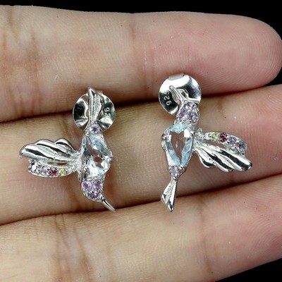 Gemsporium 925 Sterling Silber Ohrringe Himmelblauer Topas Pear 6x4mm