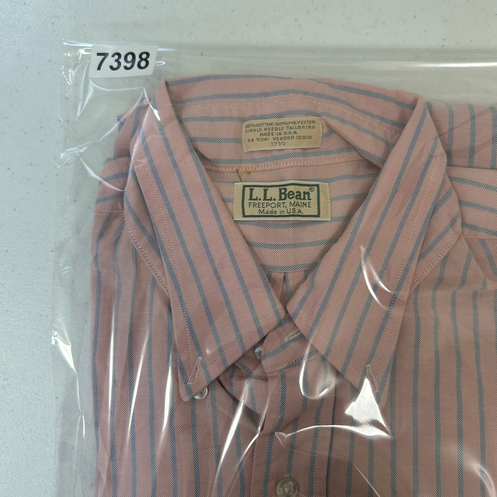 Vintage LL Bean mens 17.5 short sleeve oxford with pink, blue, and white vertical stripes, brown collar, and white LL Bean label.