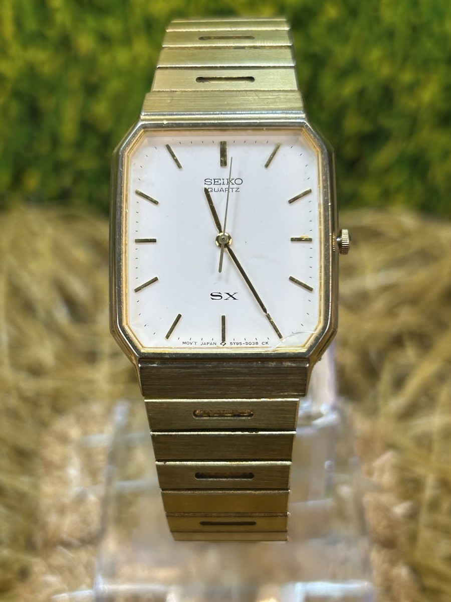 Vintage Men's Gold Tone Seiko SX Tank Style Quartz Watch. Runs