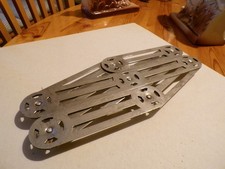 Dessous de plat zig-zag pliables en inox - Lot 2 pièces