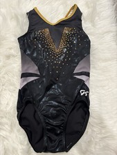 GK Gymnastics Leotard size ASM, Black and Gold. NWOT
