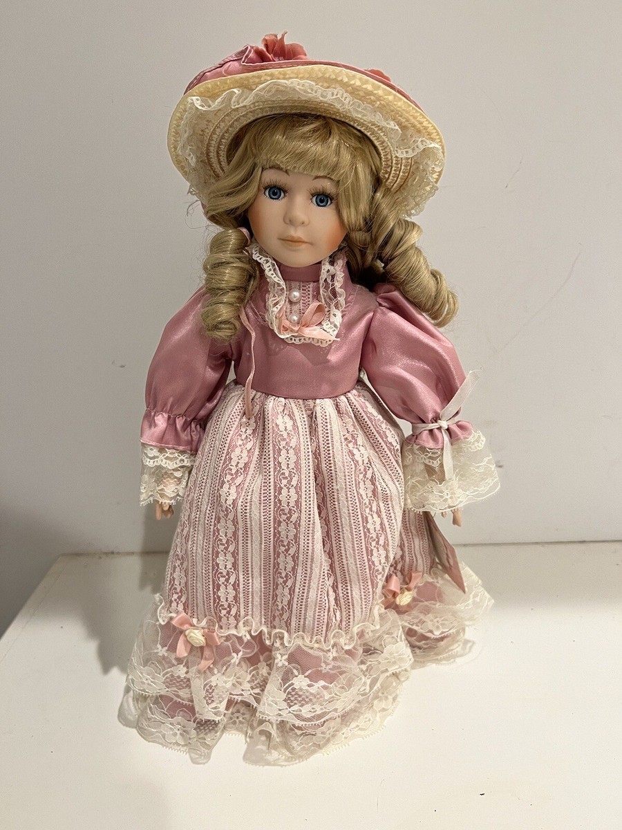 Vintage Porcelain Doll with Stand Unbranded Pink Victorian Outfit