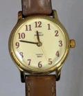 Vintage Timex Women's 25 Mm Gold Tone Indiglo Quartz Watch Leather Bands