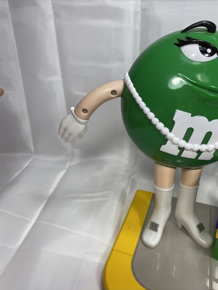 M&M's Ms. Green Girl M&M Taxi Stand with Gifts Presents Candy