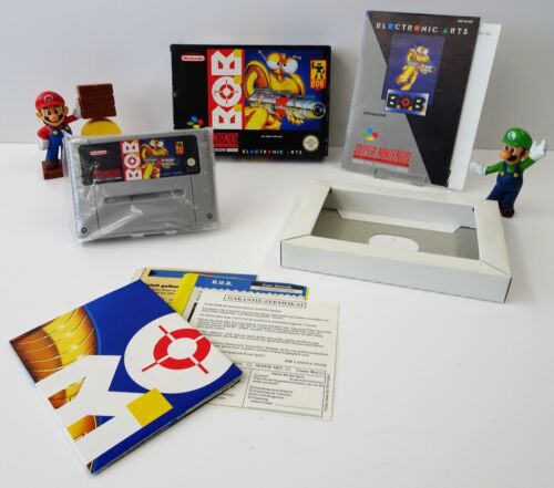 Gioco Super Nintendo SNES - BOB + poster + istruzioni + IMBALLO ORIGINALE - CIB  - Foto 1 di 2