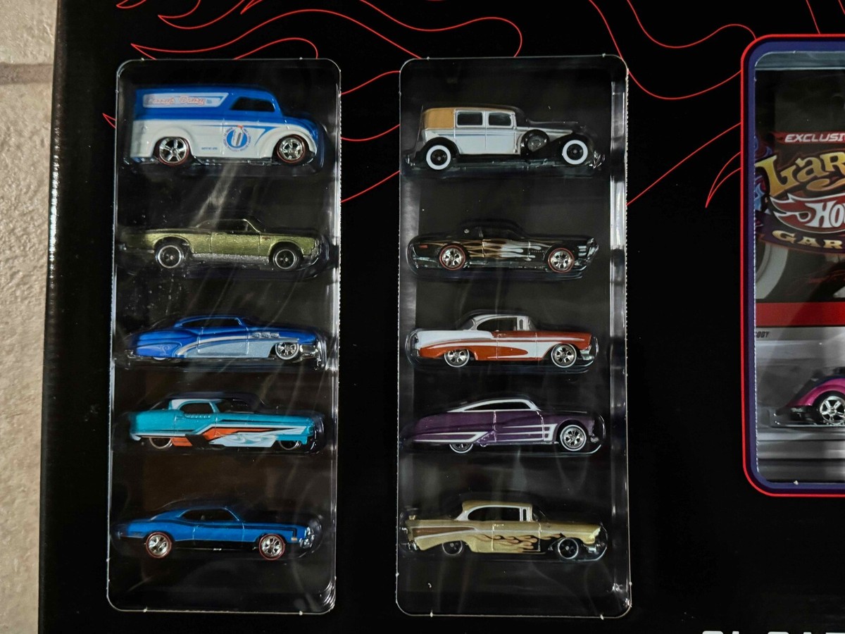 Hot Wheels Larrys Garage 21 car set 2009 Factory Sealed Pink