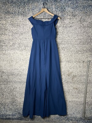 crossover off shoulder dress Style 992709 A blush off-shoulder midi with a sculpted crossover neckline and A-line silhouette, finished with intricate navy floral embroidery for a romantic yet refined contrast. Where would you wear this
