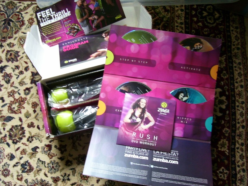 Zumba Fitness Exhilarate Program 5 DVDs, Program Guide and Toning Sticks