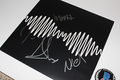 ARCTIC MONKEYS BAND SIGNED 'AM' ALBUM VINYL RECORD LP BECKETT COA