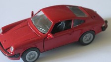 Porsche; 1.43 scale, 1989 model of the 911 in red.