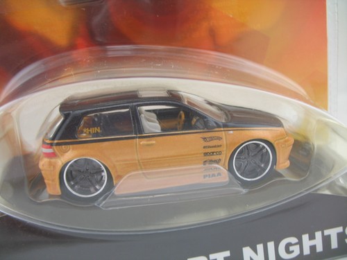 Hot Wheels HIN Model G8218: VW Golf, Gold - Picture 2 of 8