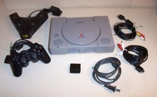PLAYSTATION 1 CONSOLE SCPH-5501 + SONY CONTROLLER + MEMORY CARD+ CORDS+ MADCATZ