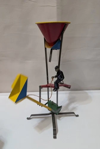 Wolverine Tin Metal Sand Dumping Machine With Man Operator In Great Condition