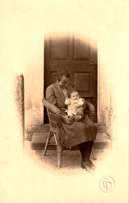 Postcard mother has baby on her lap - publisher: GD