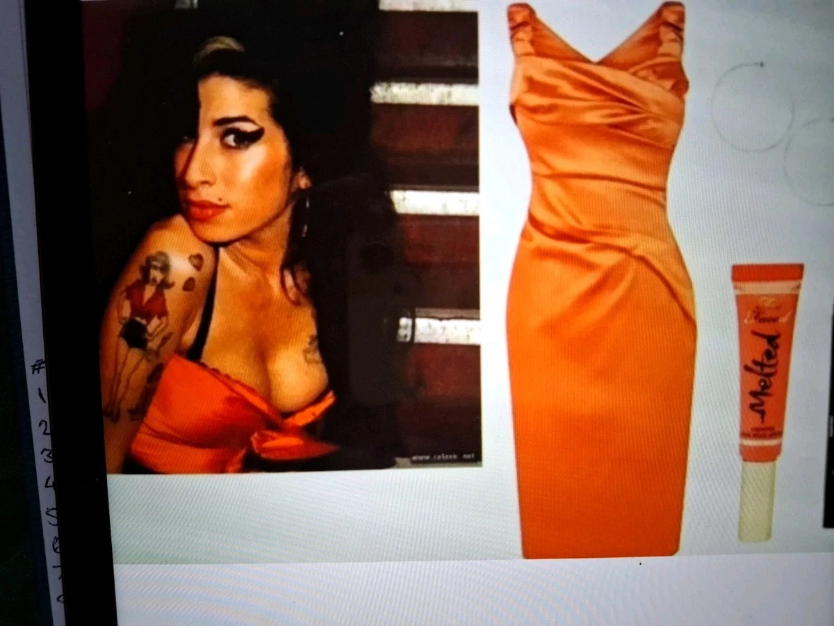 amy winehouse orange dress Yesterday marked the 18th anniversary of Amy's iconic Brit Award win for  'Best Female Solo Artist'. 