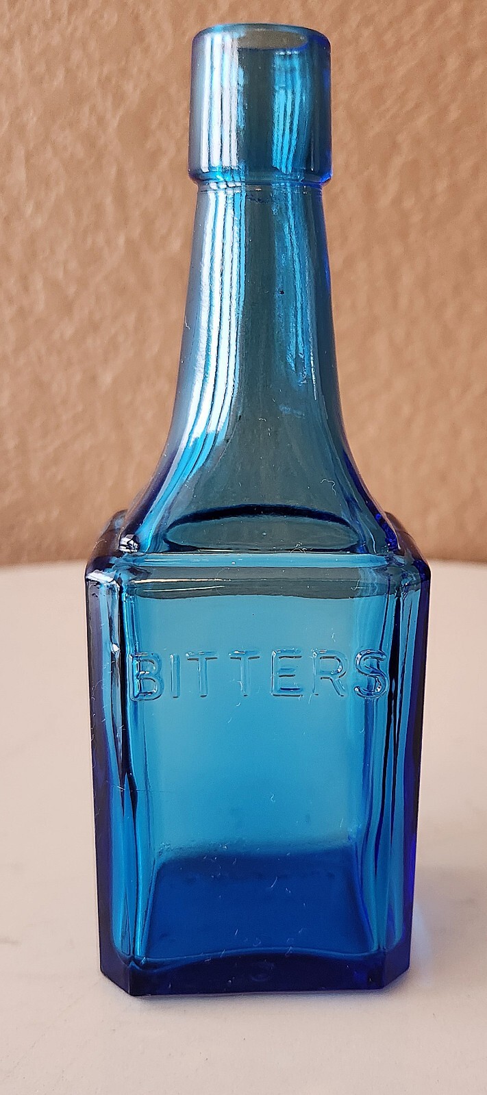 Wheaton NJ Blue Glass Embossed “Bitters” Bottle