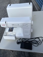 Máquina de coser Janome HD3000 de alta resistencia - calidad usada con pétalo de pie