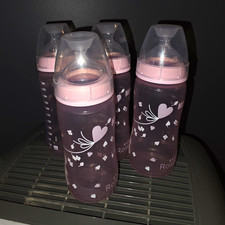 4 Pack NUK Pink Bottle Set 10oz/300ml BPA-Free Plastic, Silicone Nipple 0m