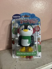 Penguin "Holiday Pooper" Walking Candy Dispenser - Wind Up Go