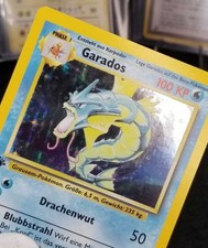 website to check value of pokemon cards Amazon.com: Gyarados 130/165 - Magikarp - Pokemon 151 - Evolution Card Set main image 0