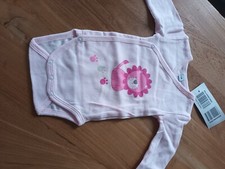 body fille, neuf, taille un mois, couleur rose 