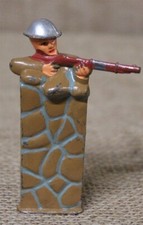 Barclay Dime Store Toy Soldier 1330: Soldier Firing from behind Wall B129 