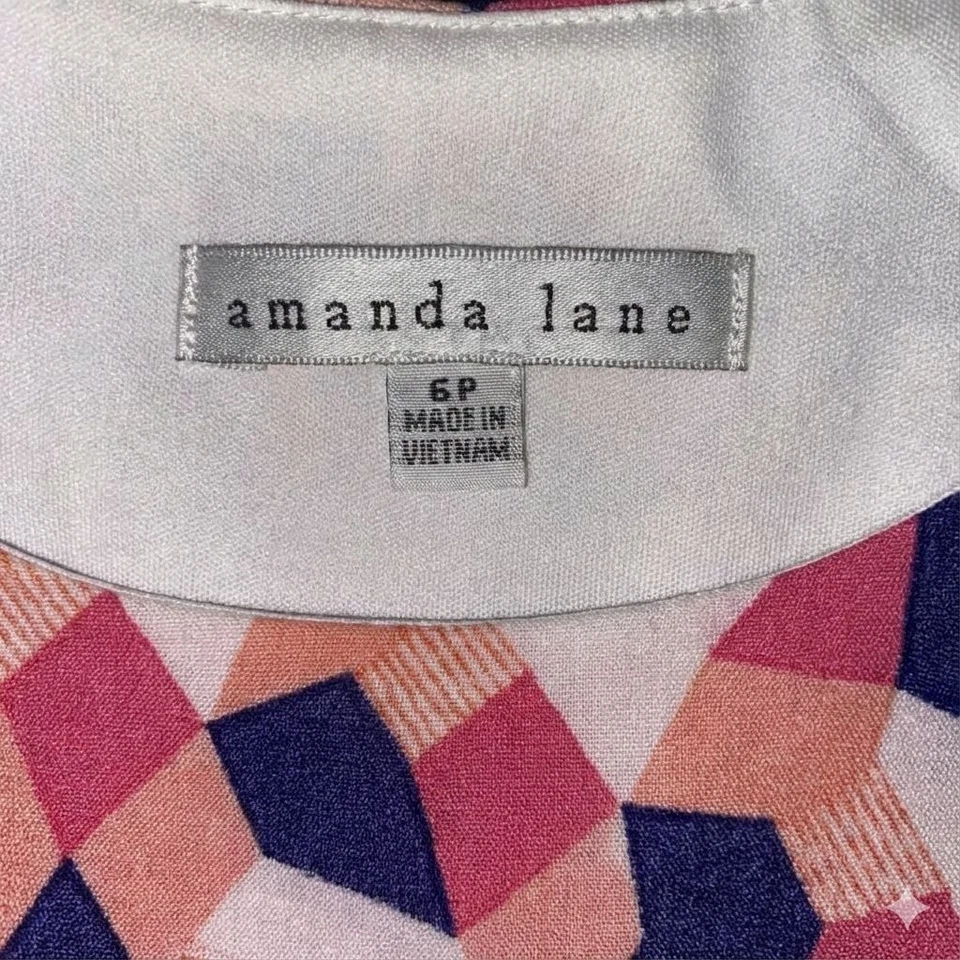 Vestido geométrico sin mangas Amanda Lane melocotón y azul marino Foto 3 de 3