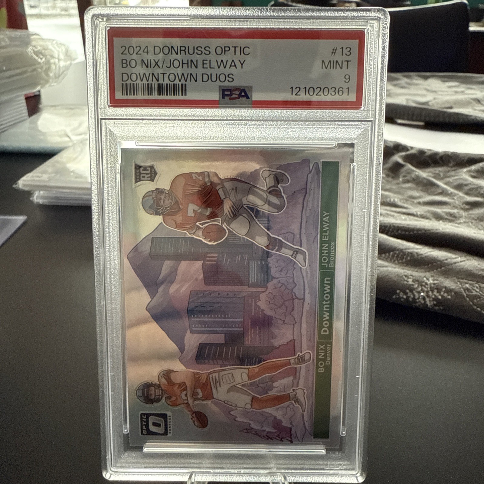 2024 Panini Donruss Optic - Downtown Duos John Elway, Bo Nix #13 (RC). PSA 9