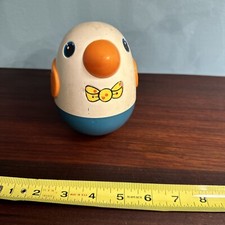 Vintage Musical Roly Poly Penguin pull behind toy