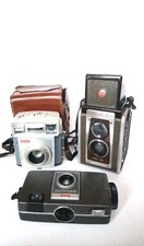 3 vintage Cameras: Kodak Brownie. Kodak Instamatic S-10. Kodak Dualflex IV