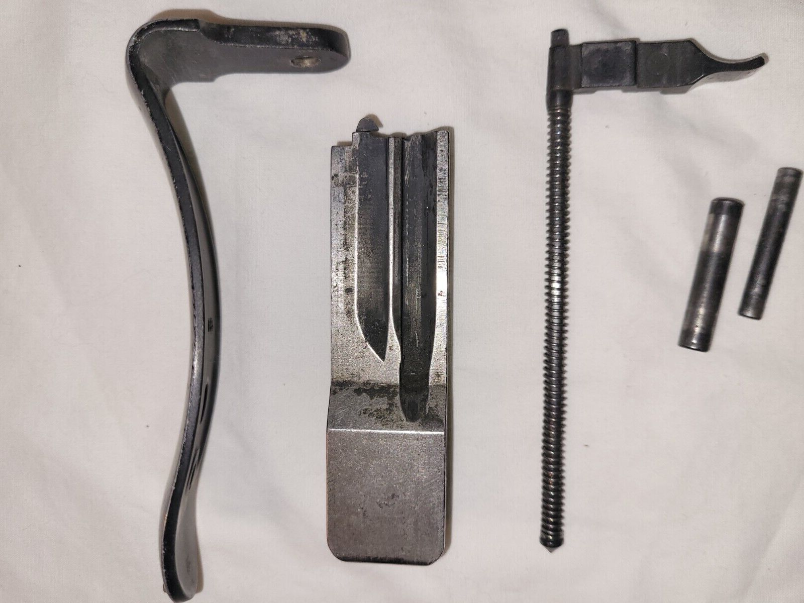 Used Ruger 10/22 Bolt and handle and metal butt plate