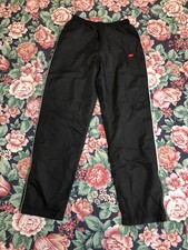 Vintage Nike Track Pants Kids XL 18-20 Black Nylon Y2K Swoosh Baggy Windbreaker