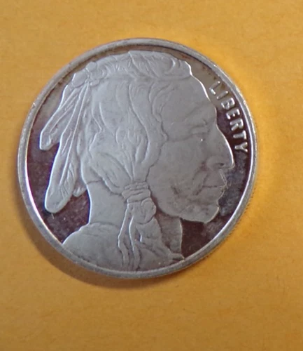 1/2 oz. Silver Buffalo Round With toning started on reverse side