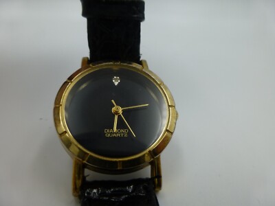 Diamond Quartz Wristwatch, it works and has a fresh  battery, Black Band & Face