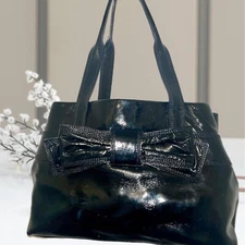 Kate Spade New York Black Patent Leather Claverly Maryanne Bow Tote Storybook