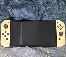 Nintendo Switch OLED 64GB White Joy-Cons + Su...