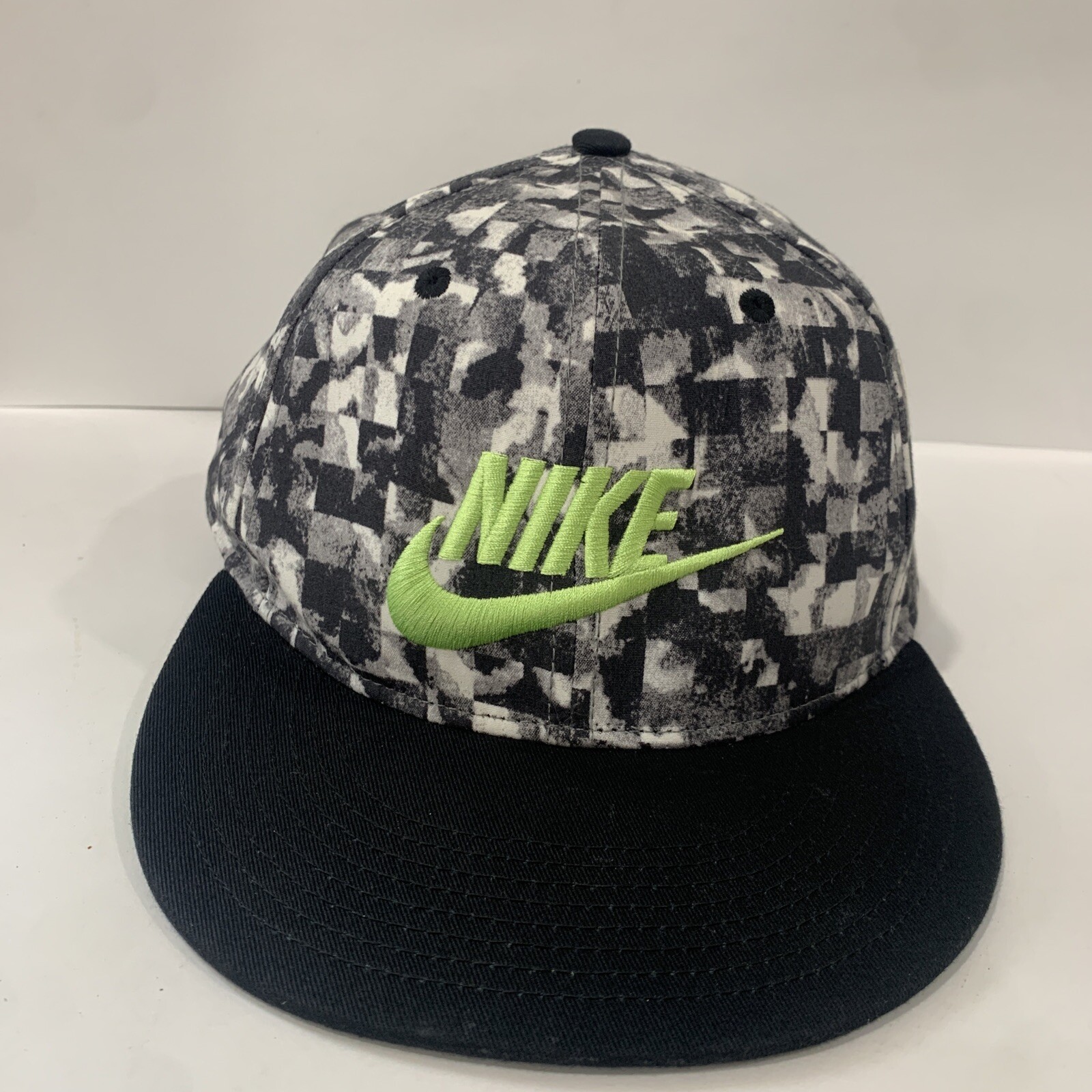 black and neon green nike hat