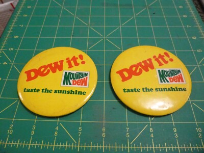 Vintage Mountain Dew ''Dew It!'' Taste the Sunshine Oversized Button Lot