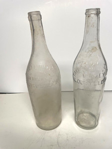 2 GLASS BOTTLES FROM TAYLOR AND WILLIAMS WHISKEY