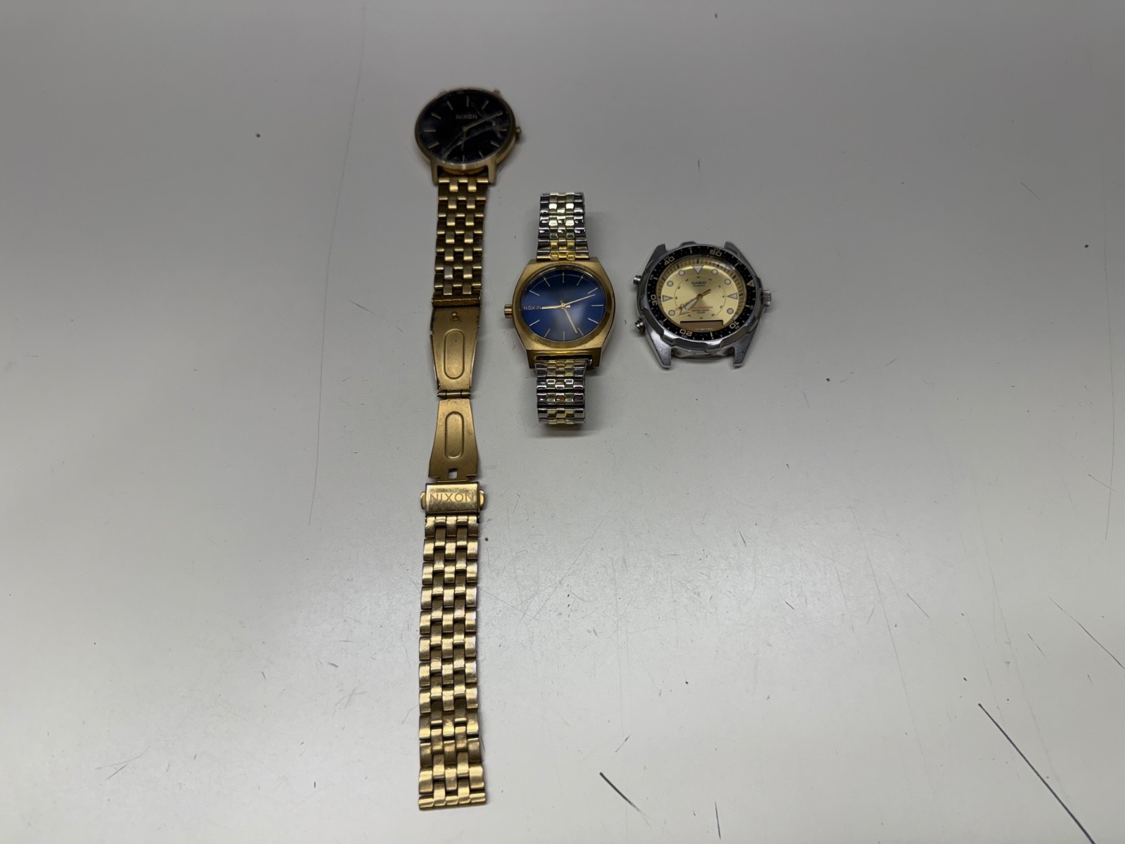 3 PARTS REPAIR 1 OF WATCHES CASIO 2 / NICE LOT NIXON AMW-3200 - vintagewatches.pk