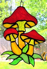 Red and Yellow Mushrooms with Green Leafs