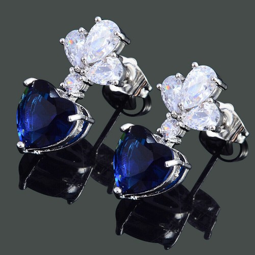 Boucles d'oreilles élégantes en forme de sphère en cristal bleu