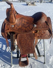 Used 16" buckstitched / tooled wide tree Western  saddle good condition