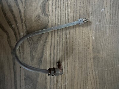 Oil line spins into oil bracket 