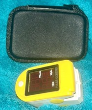   Preowned Yellow and White Pulse and Blood Oxygen Oximeter with Box  Case  