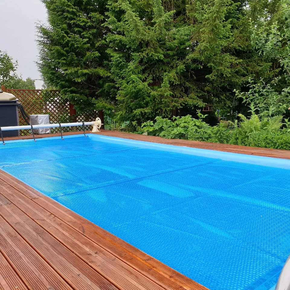 Cubierta de piscina solar rectangular de 16 x 32 pies manta aislante de retención de calor de 12 MIL Foto 4 de 4