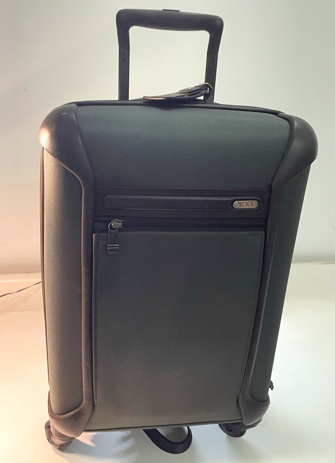 Tumi Black Polycarbonate Carry-On Spinner Rolling Suitcase 19"-22"