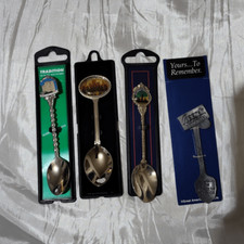 Bundle of collectible silver baby spoons with cases