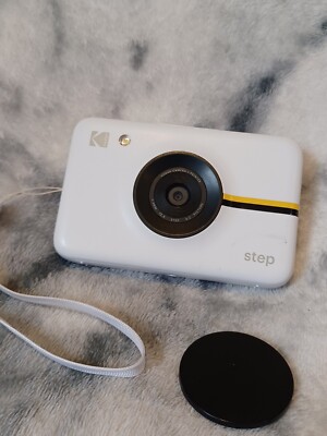 KODAK STEP Instant Print Digital Camera 10MP + Printer Zero Ink Technology